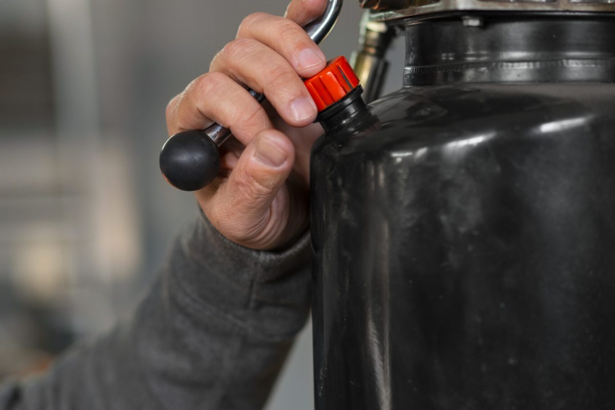 male-car-mechanic-working-car-repair-shop